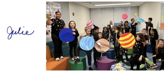 Julie's signature with picture of students performing as planets