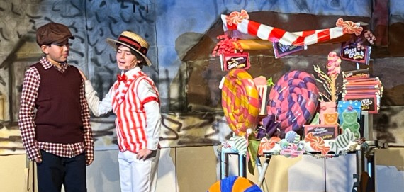 ISD students acting in Willy Wonka Kids play