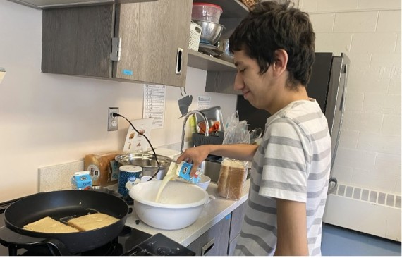 Picture of student cooking
